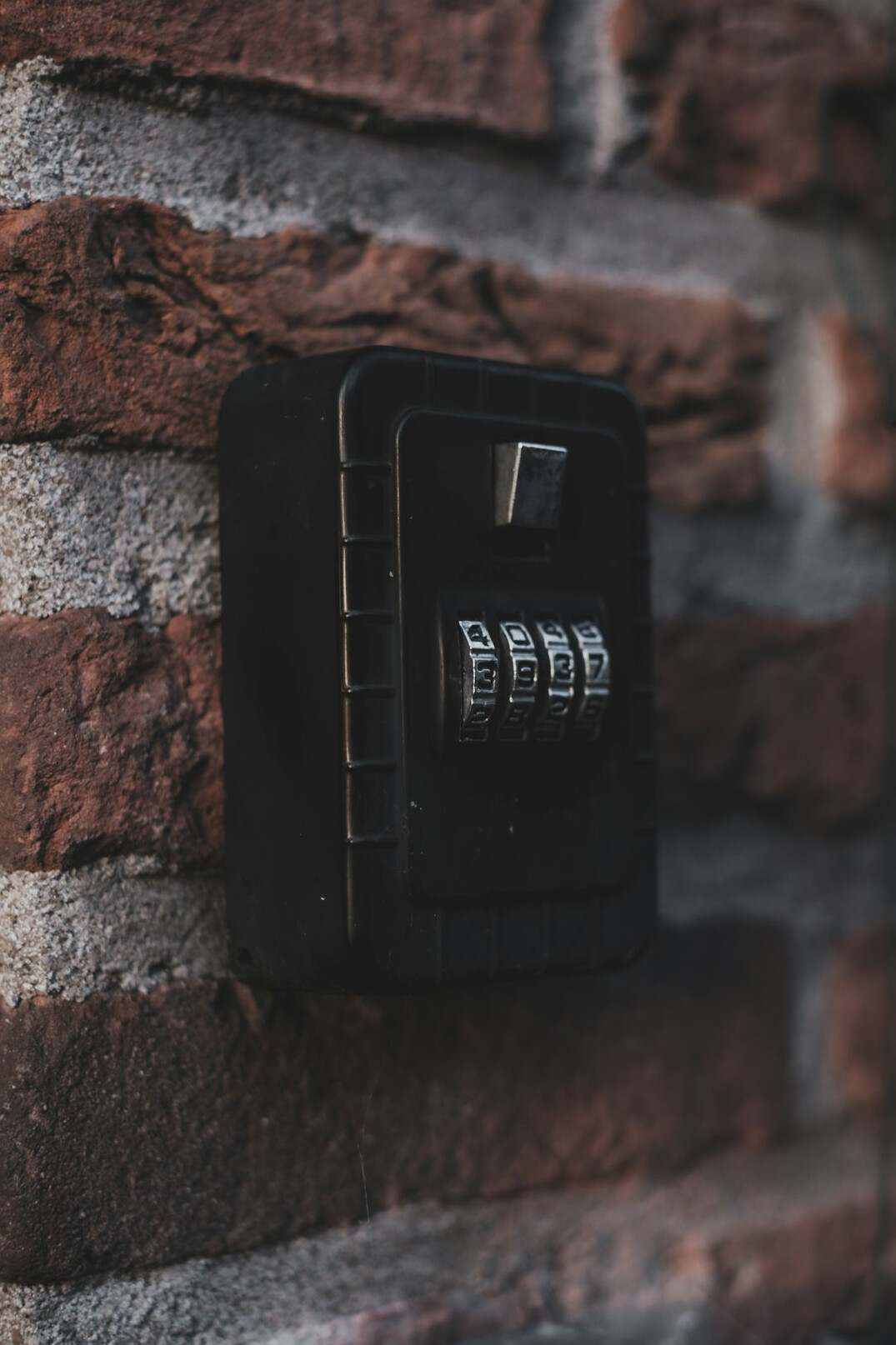Cybersecurity concept with a padlock icon over a code background