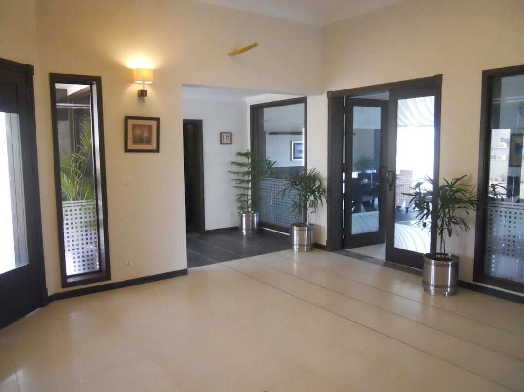 Bright modern office reception area with seating
