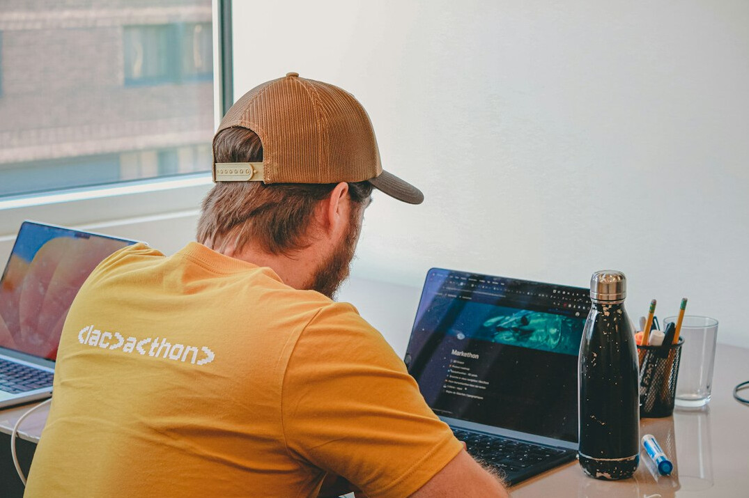 software developer coding at desk
